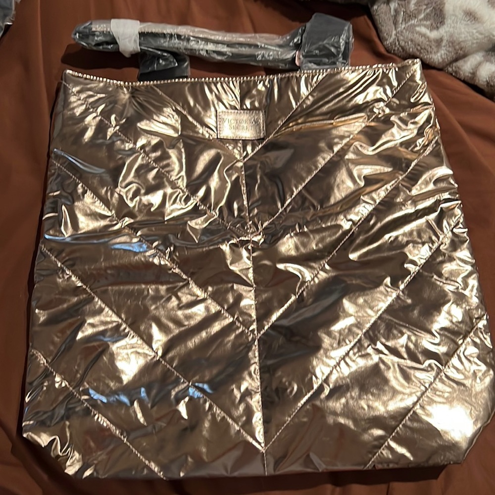 Selling a rose gold look like medium size tote